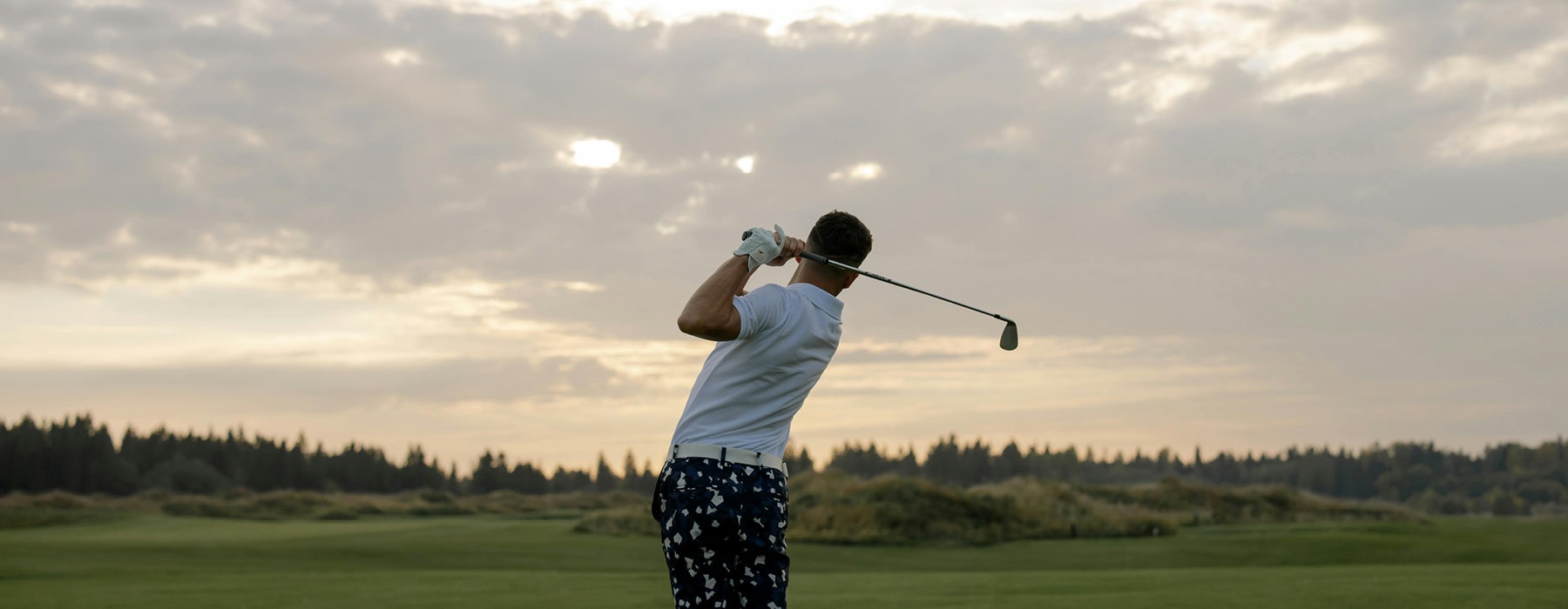 man golfing