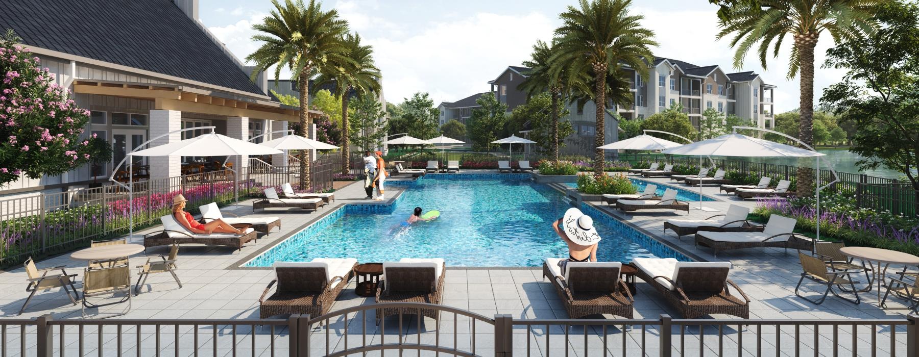 a pool with lounge chairs and umbrellas