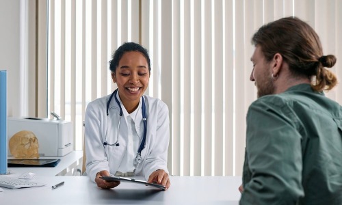 doctor talking to patient