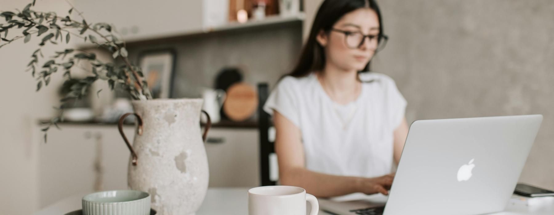 a woman working on her laptop