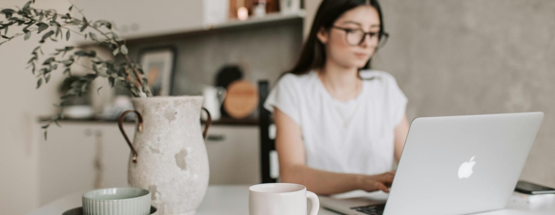 a woman working on her laptop